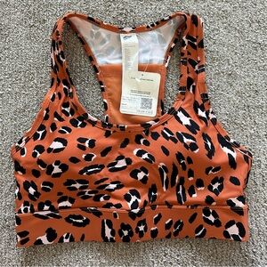 Fabletics On-The-Go Medium Impact‎ Sports Bra Burnt Ochre Wavy Leo Small